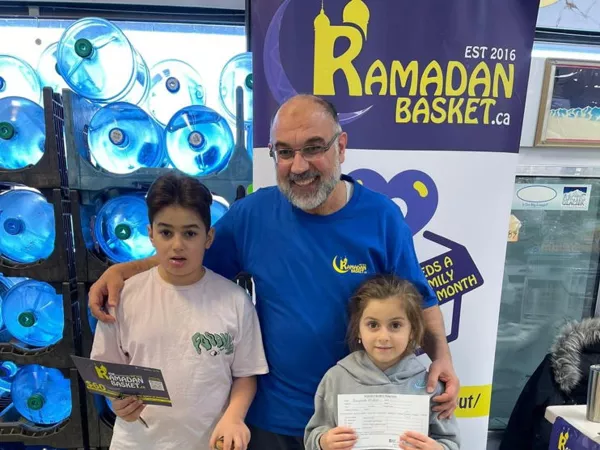 Volunteers distributing baskets in local neighborhoods